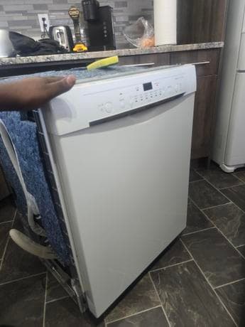 Dishwasher installation by Calgary appliance repair technician