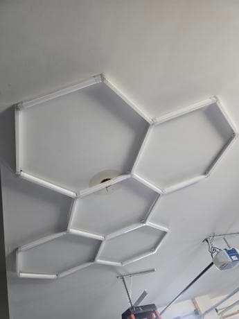 Completed hexagon LED ceiling light installation by Calgary electrician