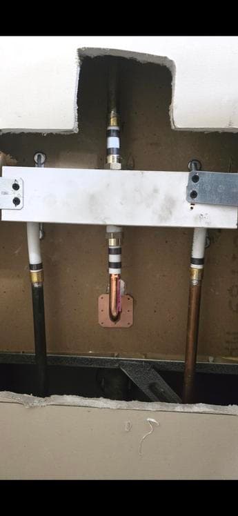 Rough-in copper and PVC pipe installation by Calgary plumber