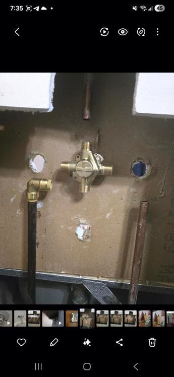 Calgary plumber installing brass shower valve rough-in fitting